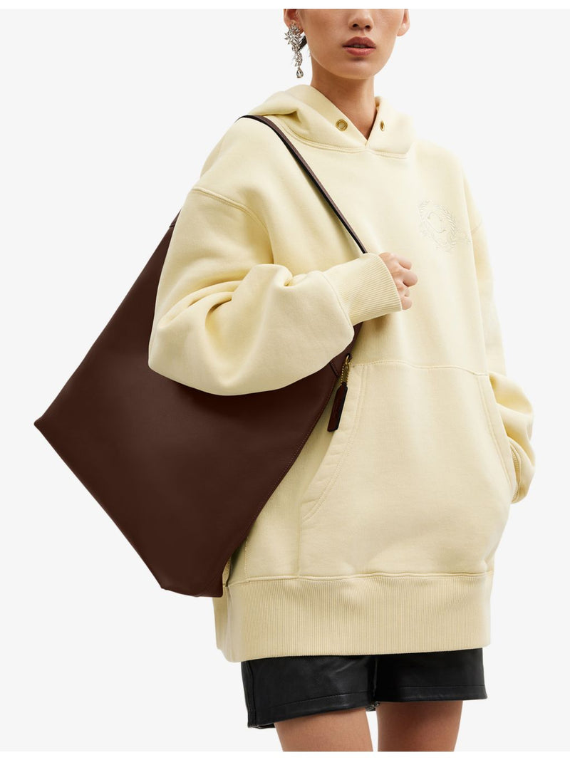 Coach Brooklyn leather shoulder bag with popper fastening, imported from the UK