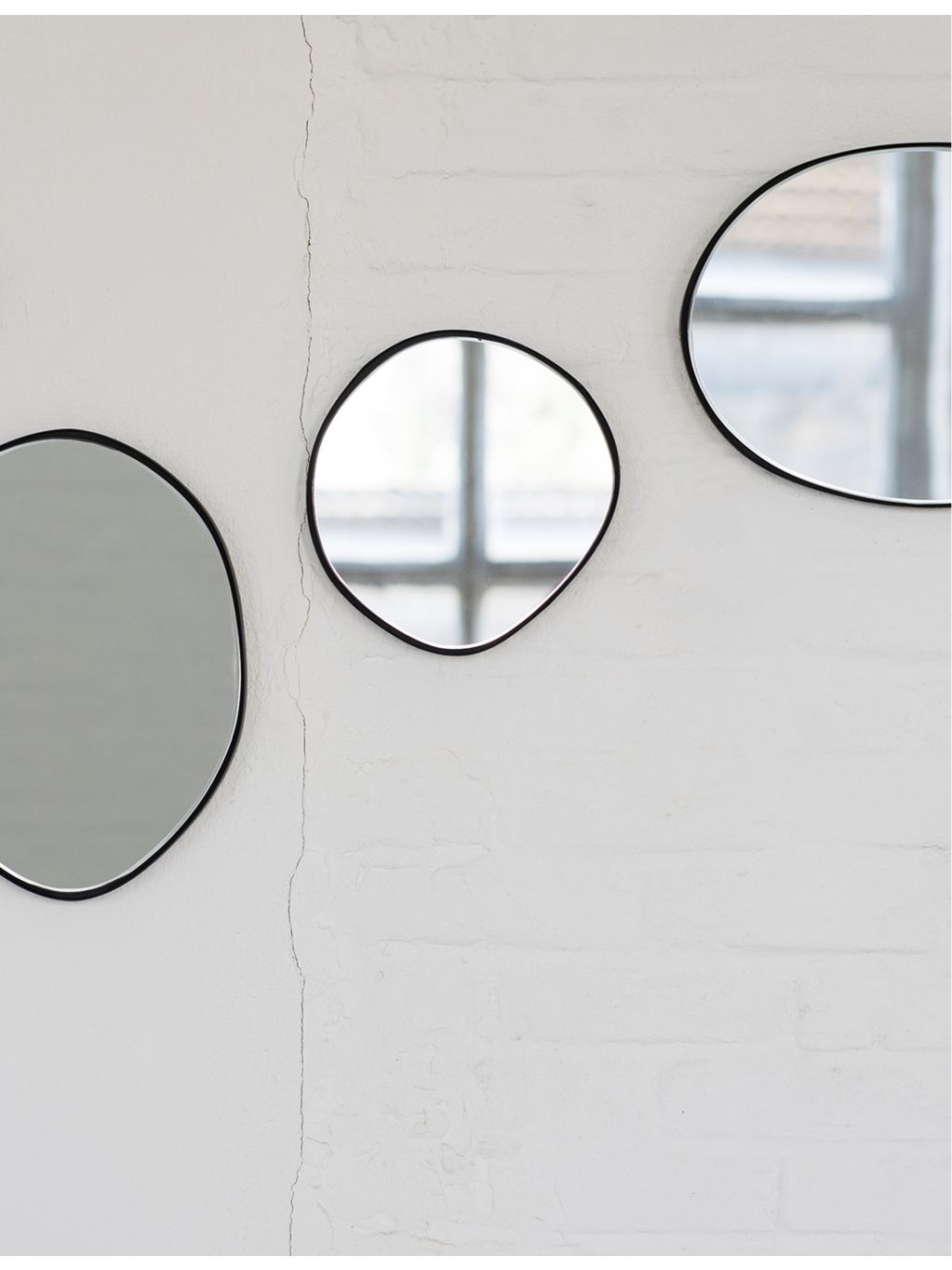 Serax steel mirror organic shape 21.5cm, imported from the UK