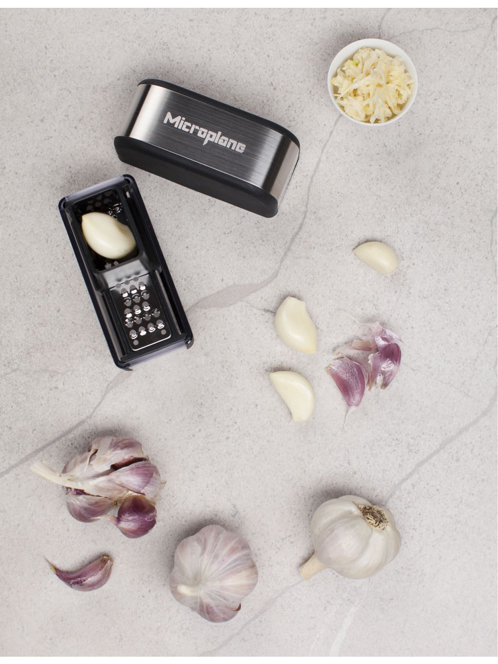 Microplane logo-embossed stainless-steel garlic cutter 9cm, UK version