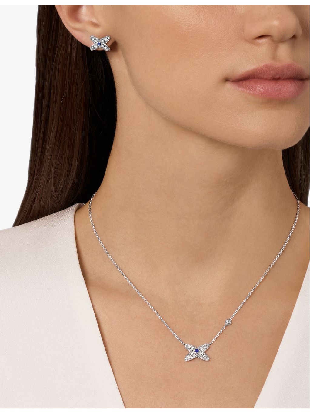 Chaumet diamond and sapphire pendant necklace, 18ct white gold, imported from the UK