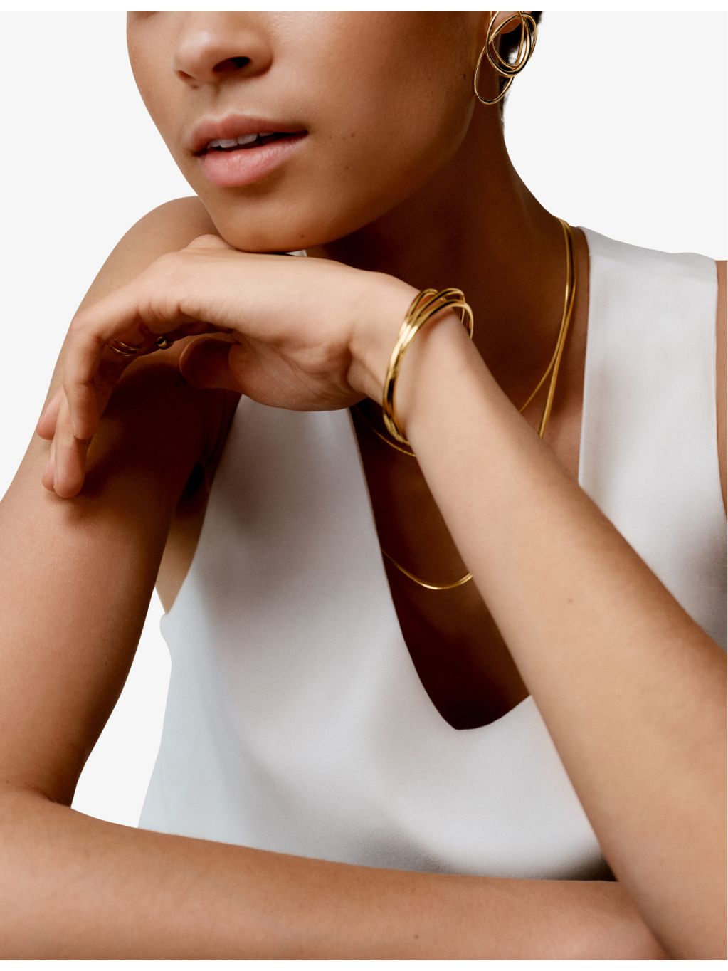 Monica Vinader Nura wrap bangle bracelet in gold vermeil - British product