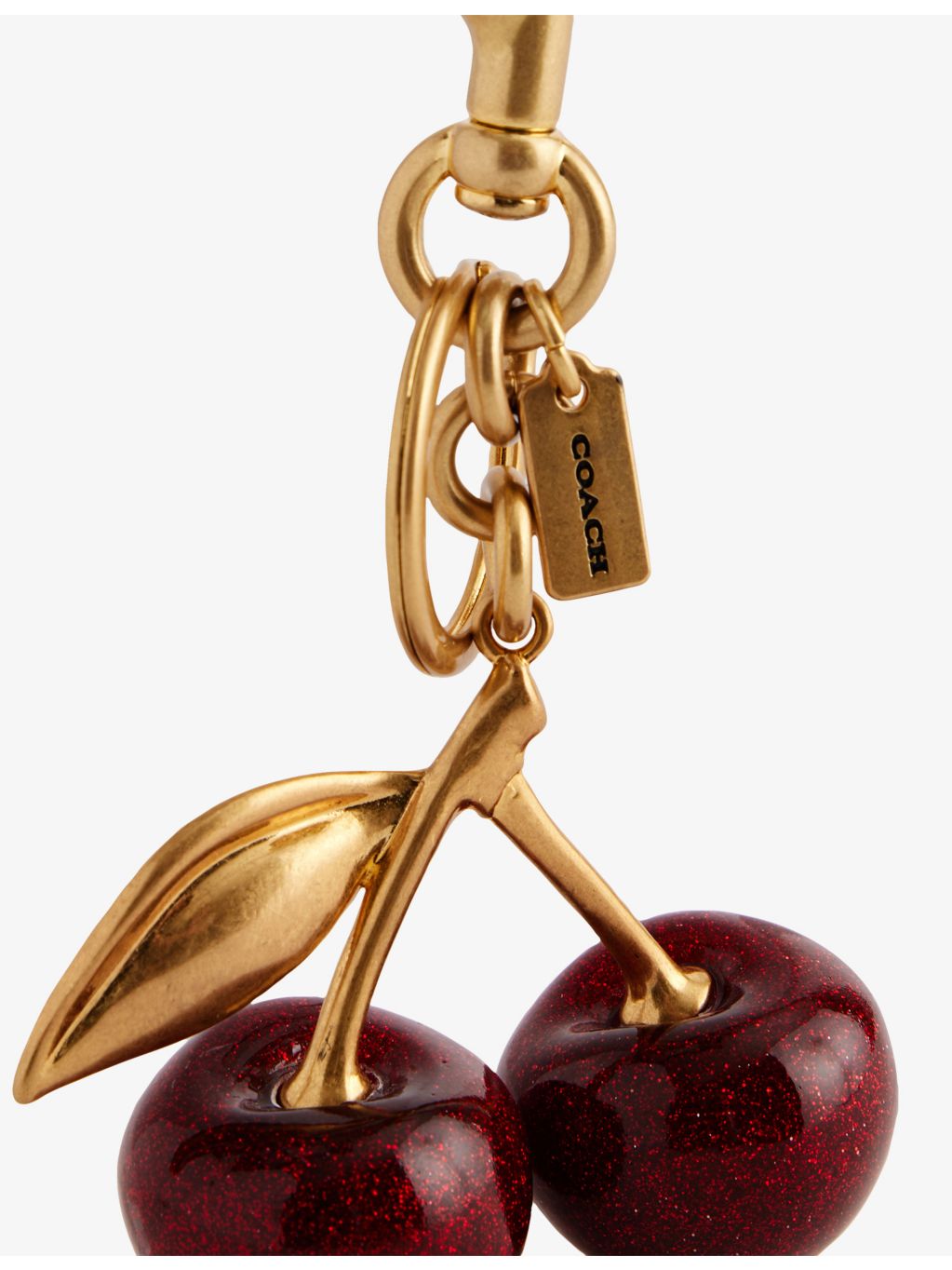 Coach cherry bag charm in brushed brass 7.6cm imported from the UK