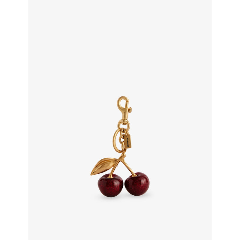 Coach cherry bag charm in brushed brass 7.6cm imported from the UK
