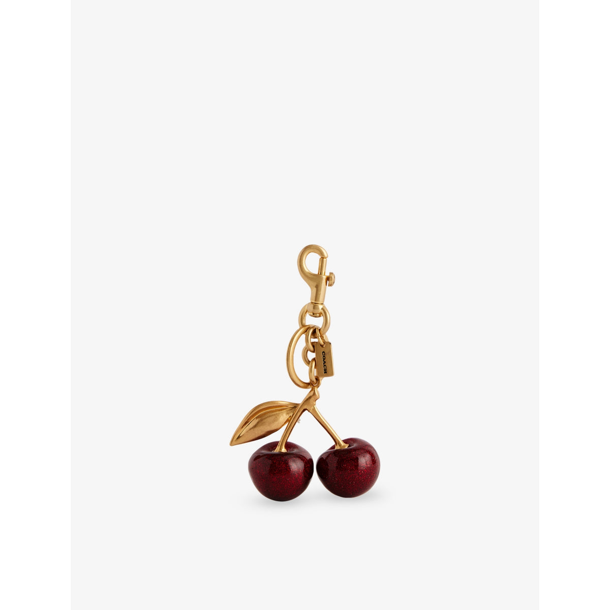 Coach cherry bag charm in brushed brass 7.6cm imported from the UK