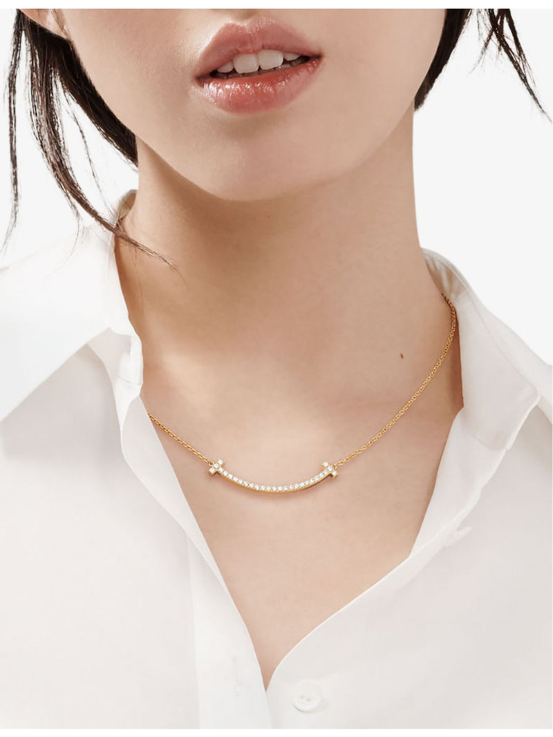 Tiffany T Medium Smile pendant necklace 18ct yellow gold diamond, UK version