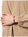 Element 925 sterling silver bracelet with silk cord, imported from the UK
