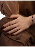 APM Monaco rose gold plated cubic zirconia ring, UK version