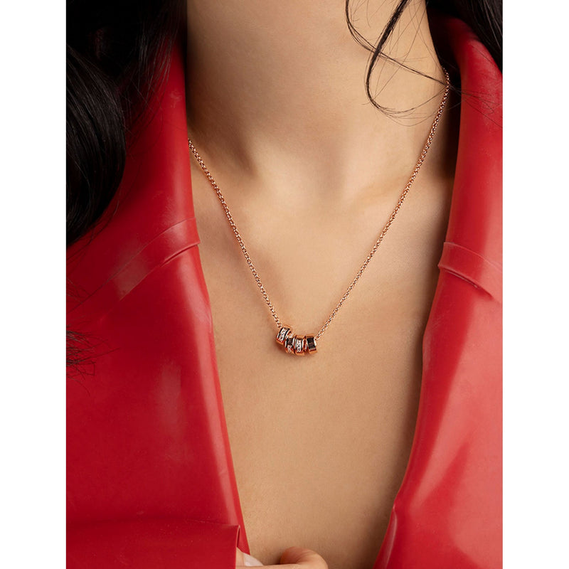 APM Monaco rose gold-plated pendant necklace with cubic zirconia, imported from the UK