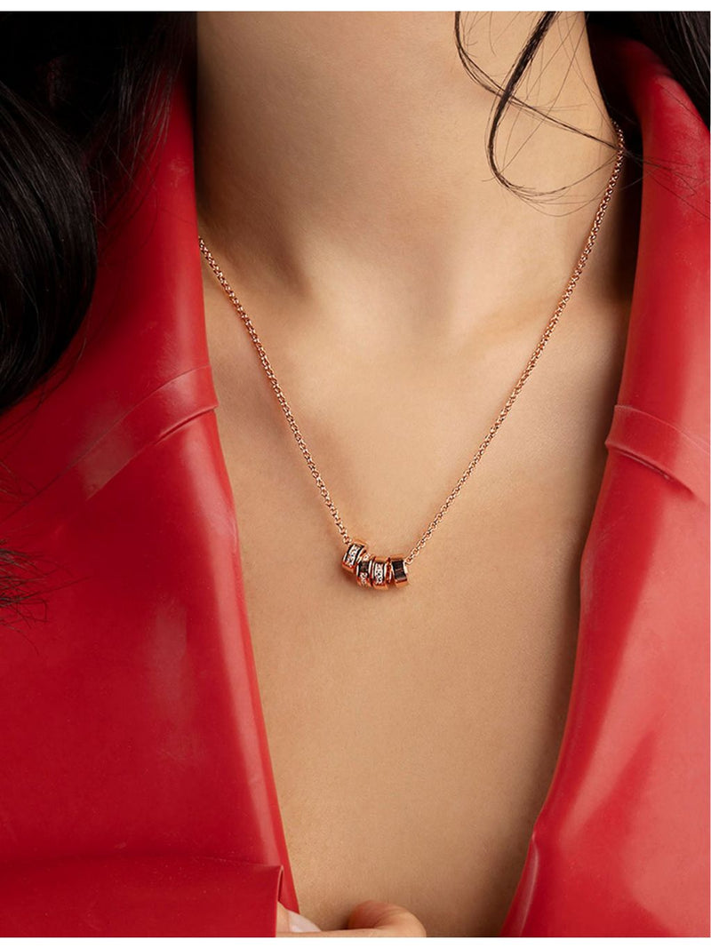 APM Monaco rose gold-plated pendant necklace with cubic zirconia, imported from the UK