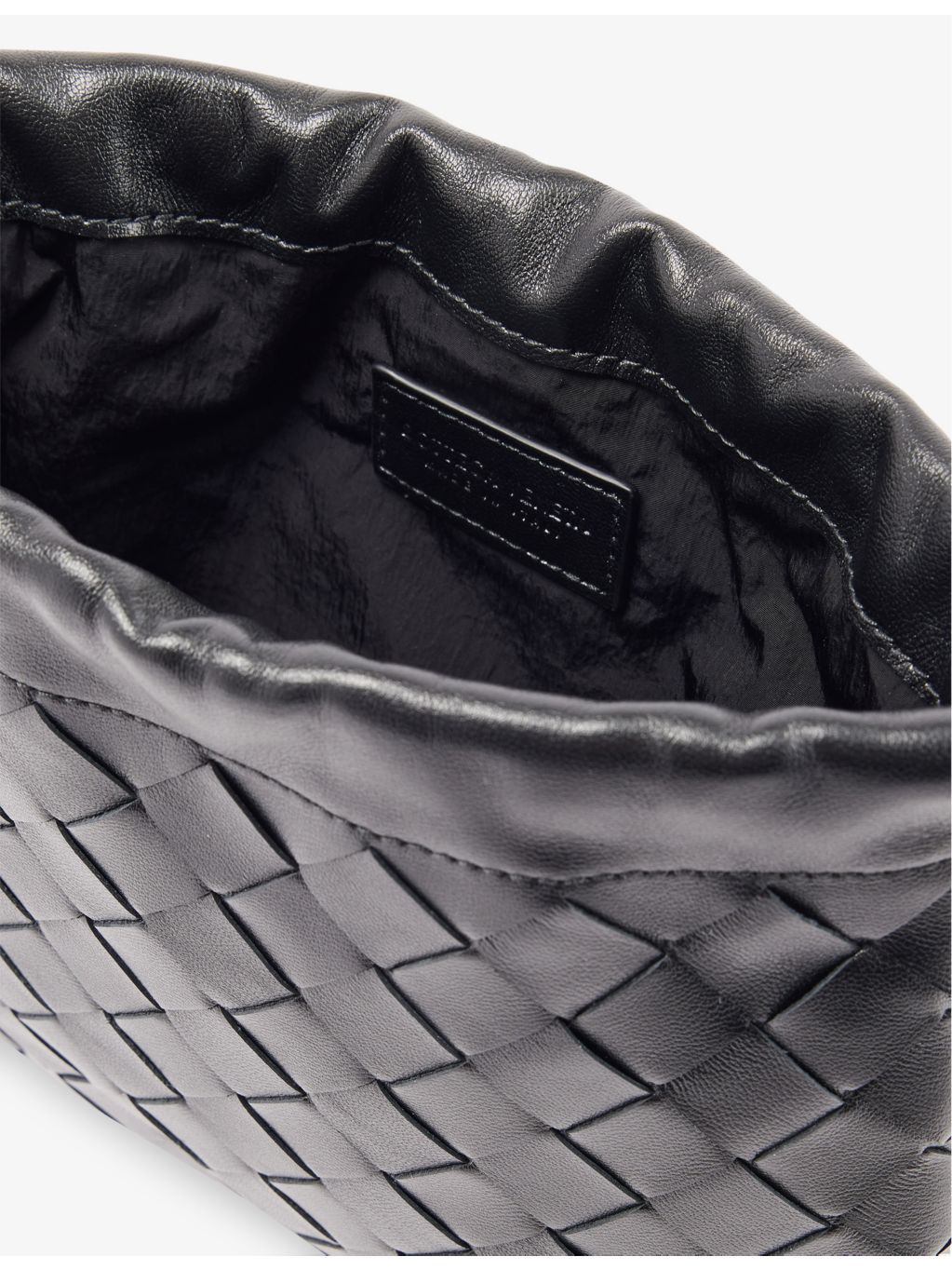 Bottega Veneta Dustbag small leather cross-body bag, Intrecciato weave (British brand)
