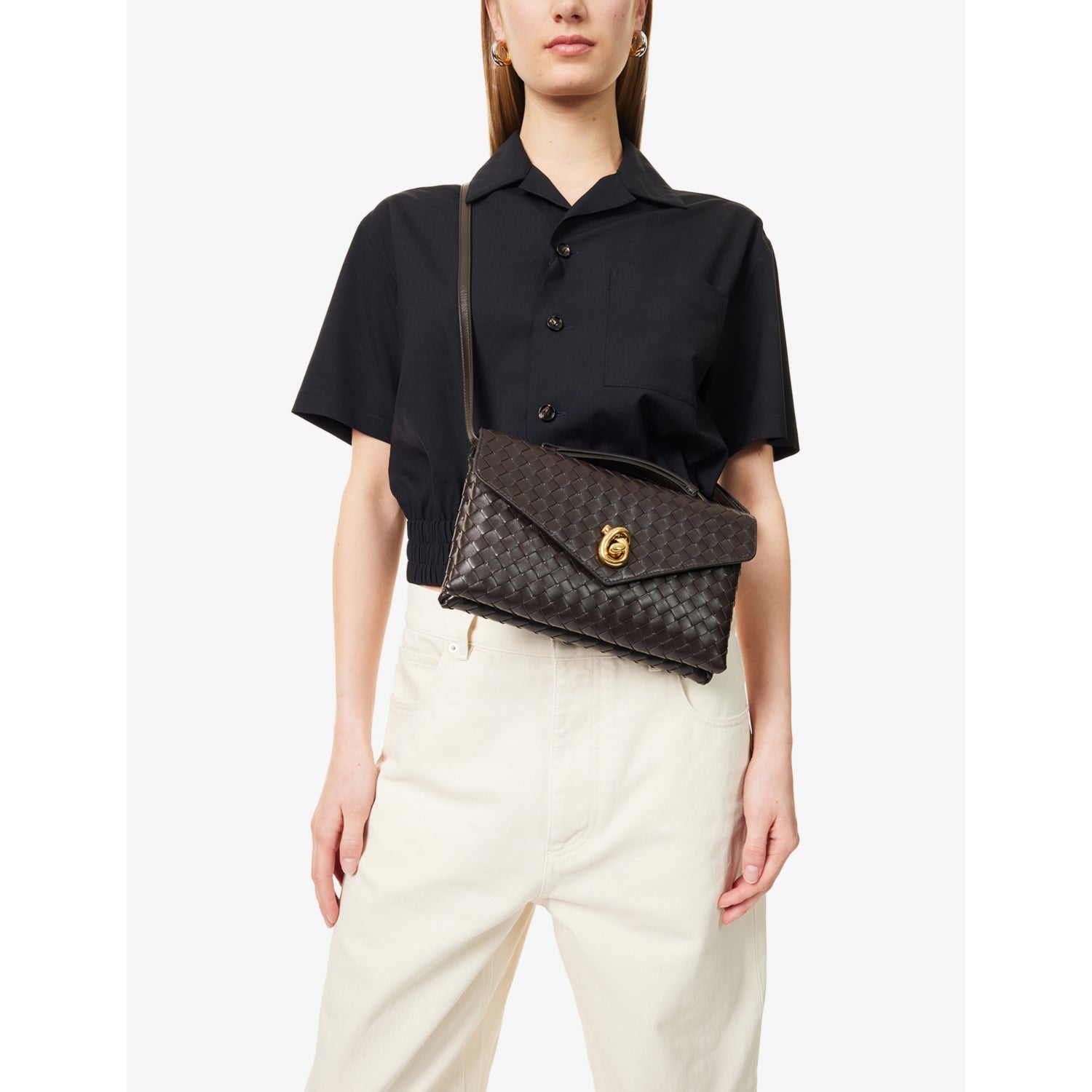 Bottega Veneta Knot Lock leather top-handle bag, imported from the UK
