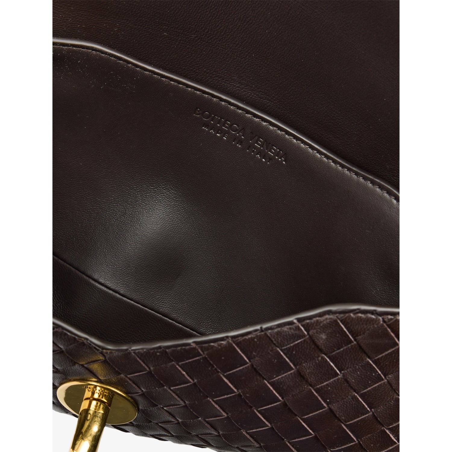 Bottega Veneta Knot Lock leather top-handle bag, imported from the UK