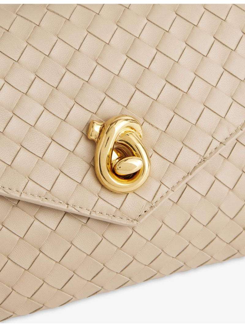 Bottega Veneta Knot Lock leather top-handle bag, imported from the UK