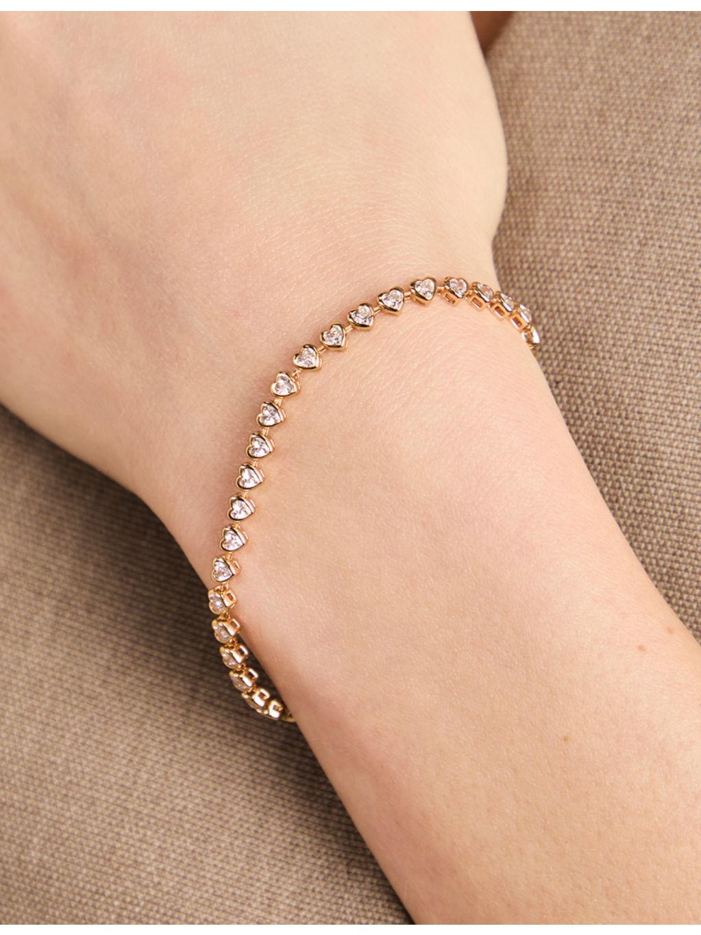 Astrid & Miyu heart bezel tennis bracelet in gold-plated brass, UK version