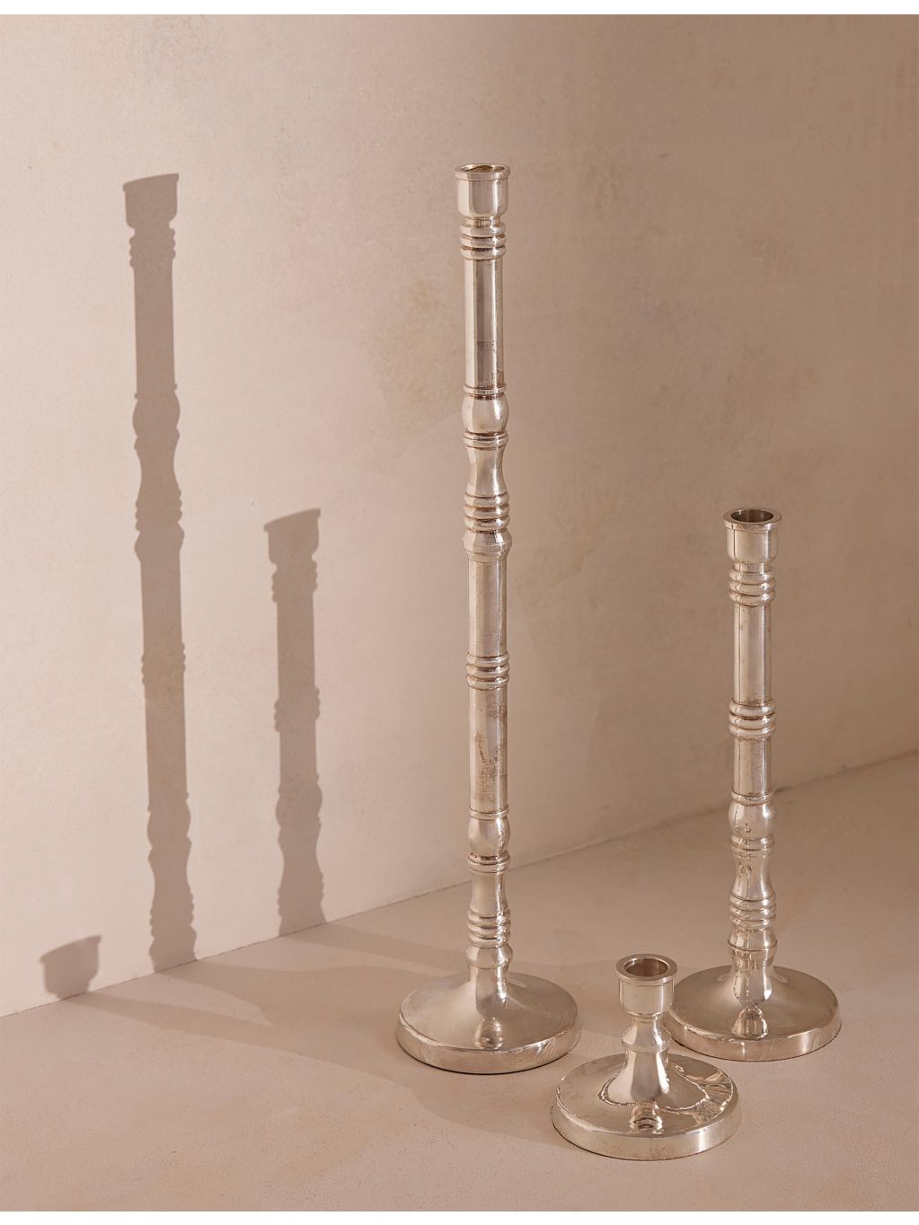 Soho Home Stiden silver-plated brass candleholder, 27cm - British product