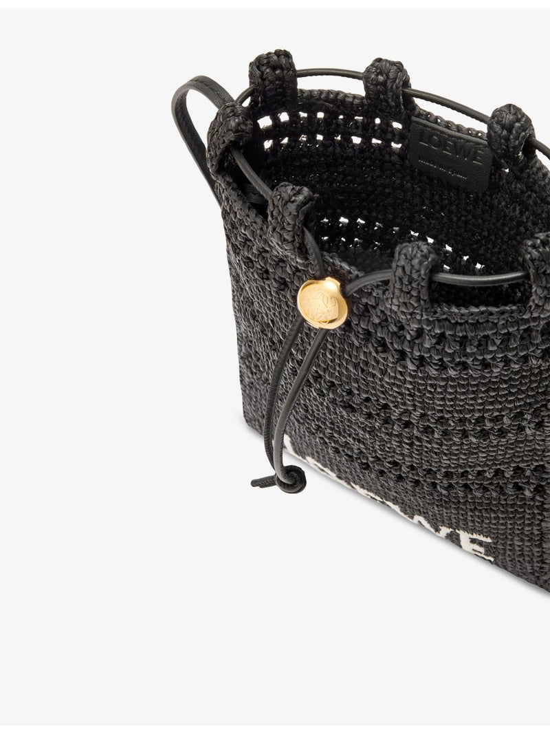 LOEWE raffia cross-body bag with leather trim and gold hardware (British brand)
