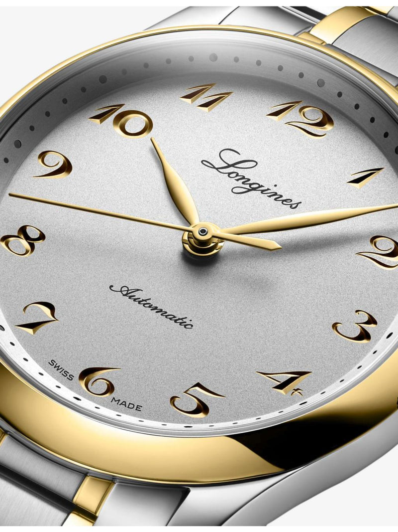 Longines automatic watch stainless steel 18ct yellow gold 34mm (British brand)