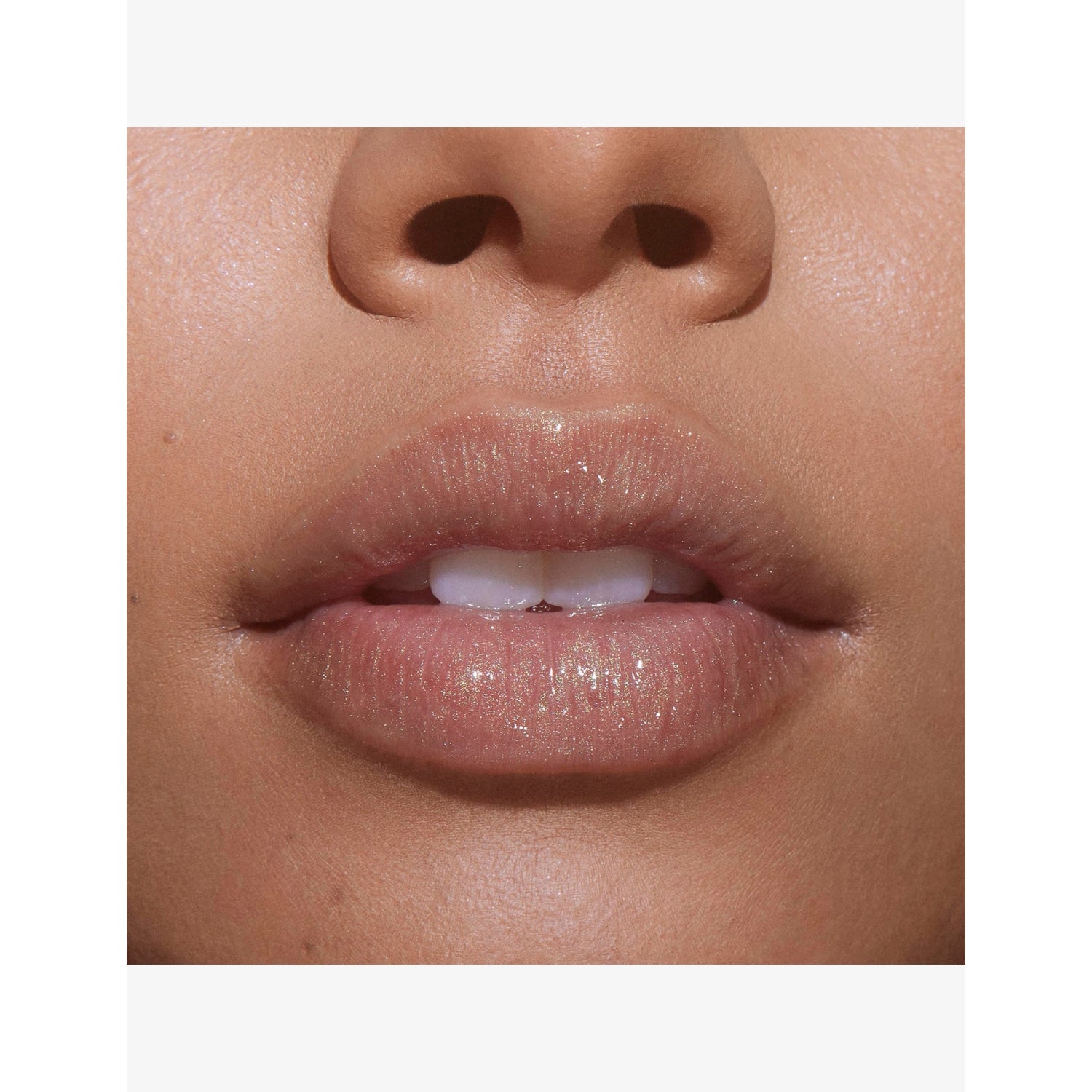 Kylie by Kylie Jenner Supple Kiss Lip Glaze 2.8g, imported from the UK