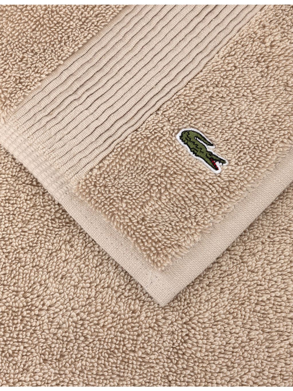 Lacoste cotton towel 600 thread count (British brand)