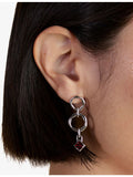 Astrid and Miyu rhodium-plated sterling silver garnet charm - British product