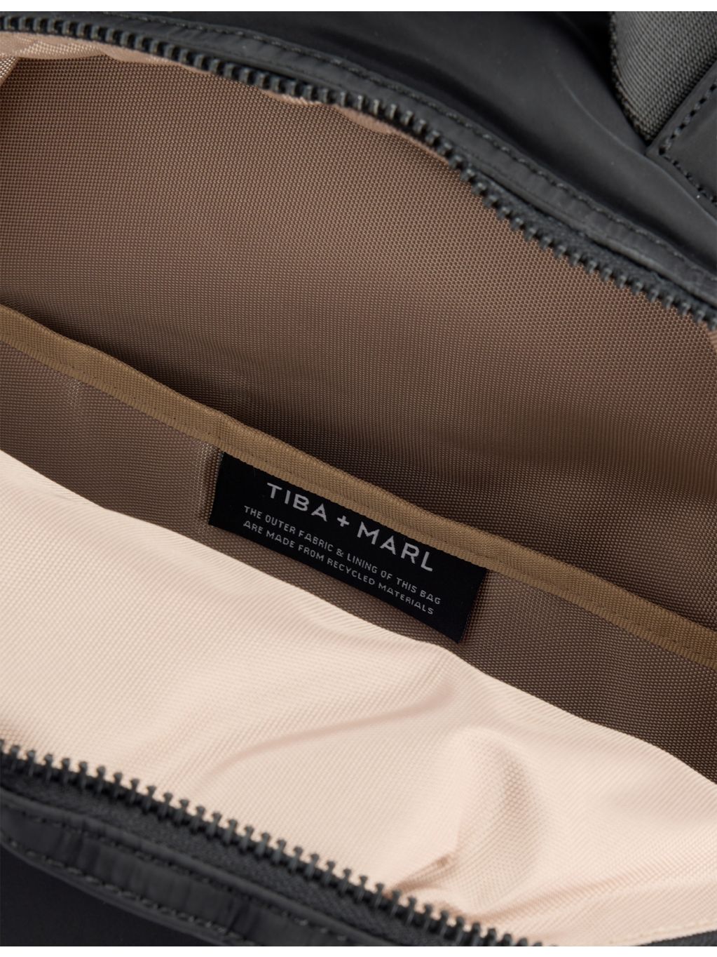 Tiba + Marl Elwood 2.0 woven changing backpack, imported from the UK
