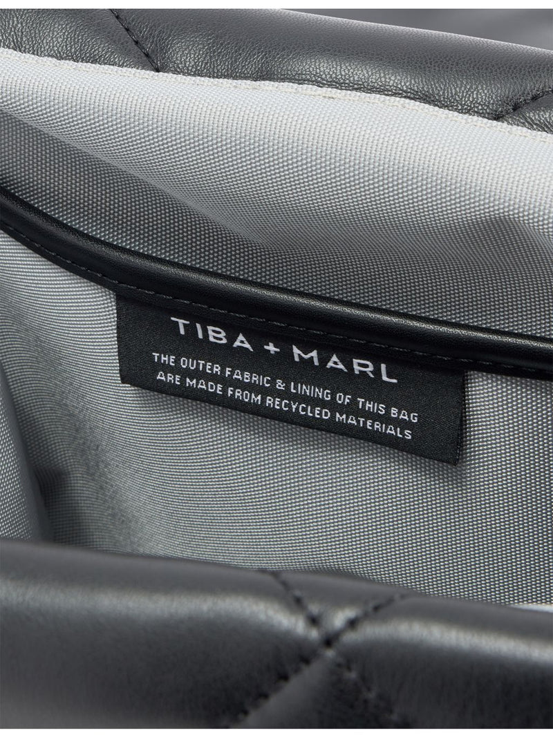Tiba + Marl quilted faux leather changing bag, imported from the UK