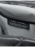 Tiba + Marl quilted faux leather changing bag, imported from the UK