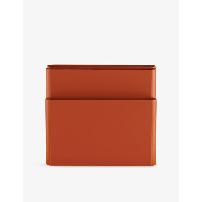 Kartell magazine rack in thermoplastic with multiple compartments, UK version