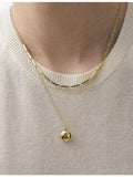 Astley Clarke yellow gold locket necklace with lab-grown white sapphires, UK version