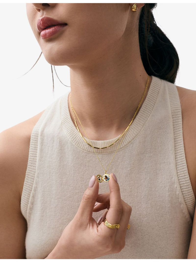 Astley Clarke yellow gold locket necklace with lab-grown white sapphires, UK version