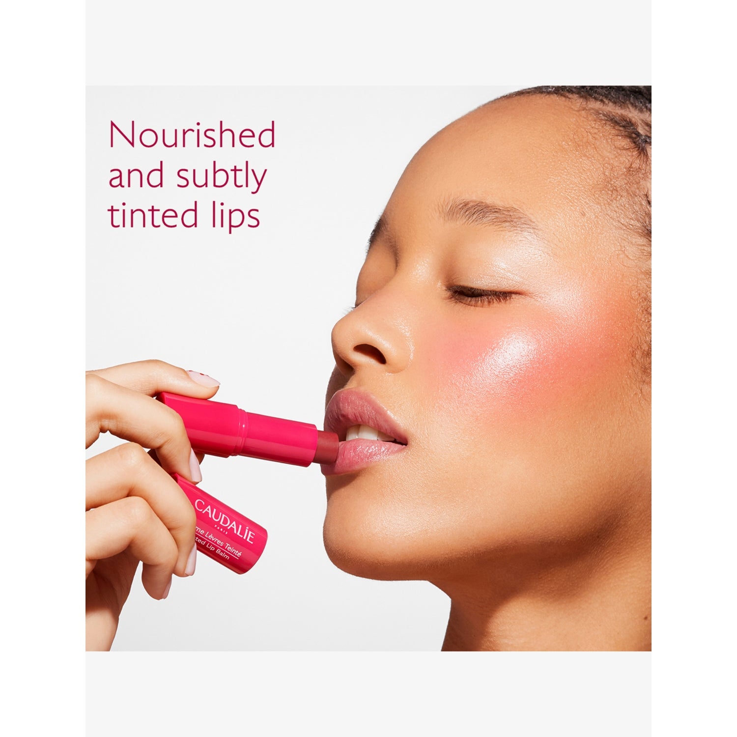 Caudalie Vinotherapist tinted lip balm, imported from the UK
