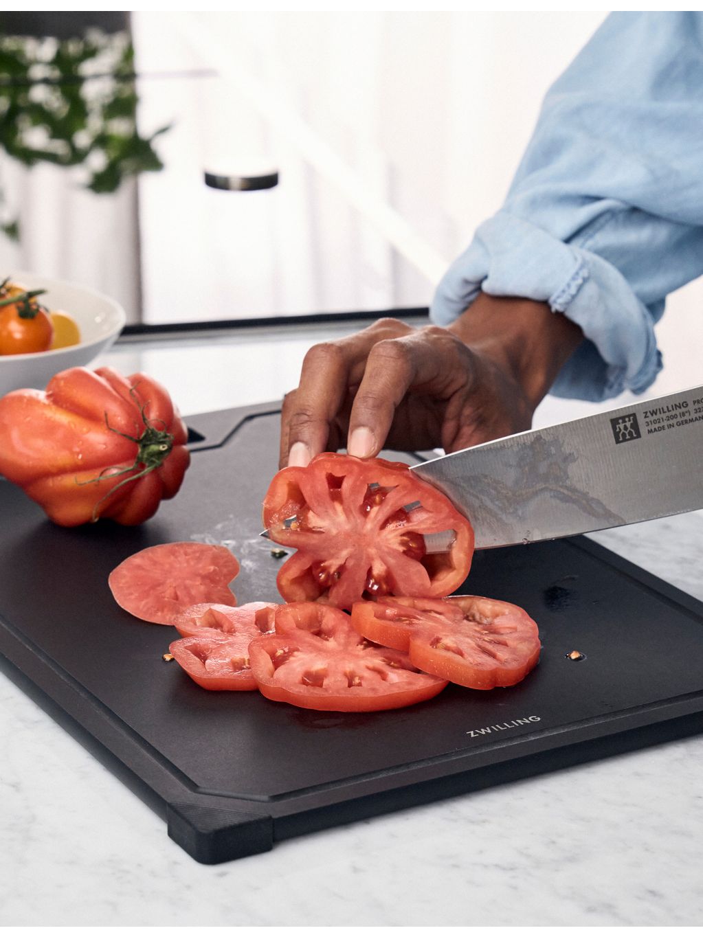 Zwilling fibre-wood chopping board 31cm by 21cm, imported from the UK