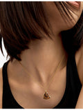 Monica Vinader heart charm pendant in 18ct gold vermeil, UK version
