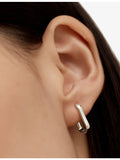 Monica Vinader Alta Capture sterling silver huggie earrings, imported from the UK