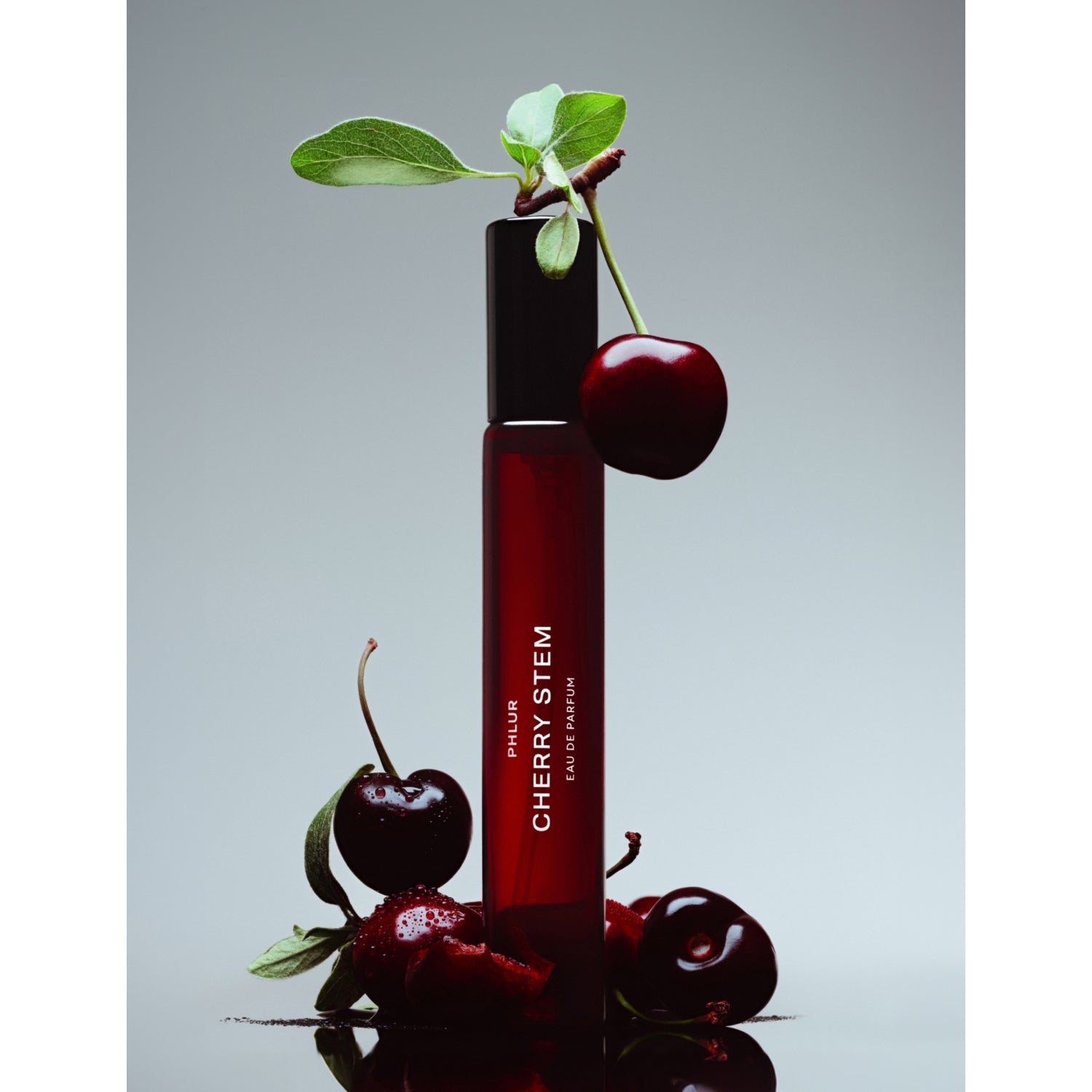 Phlur Cherry Stem Eau de Parfum travel spray 9.5ml, imported from the UK