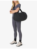 Sweaty Betty Nimbus Cloud duffel bag in soft woven fabric (British brand)