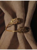 ferm LIVING holly leaf brass napkin rings, UK version