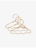 ferm LIVING Wavi rattan clothes hangers set of three - British product