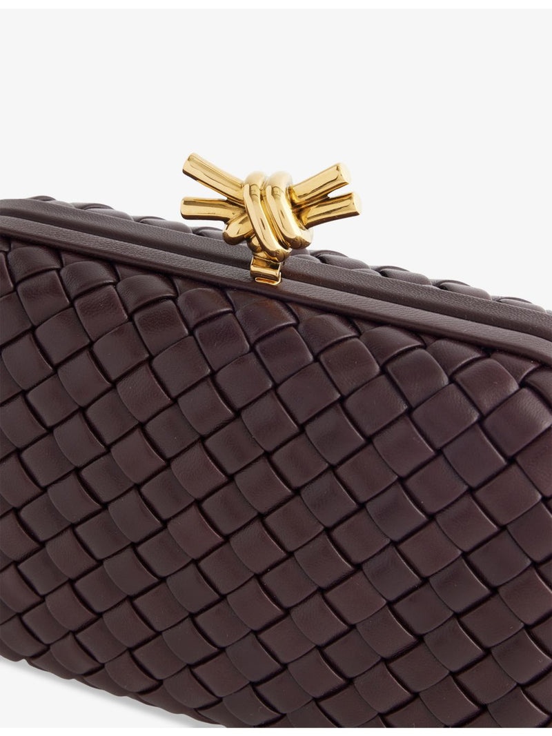 Bottega Veneta intrecciato leather clutch with gold hardware, UK version