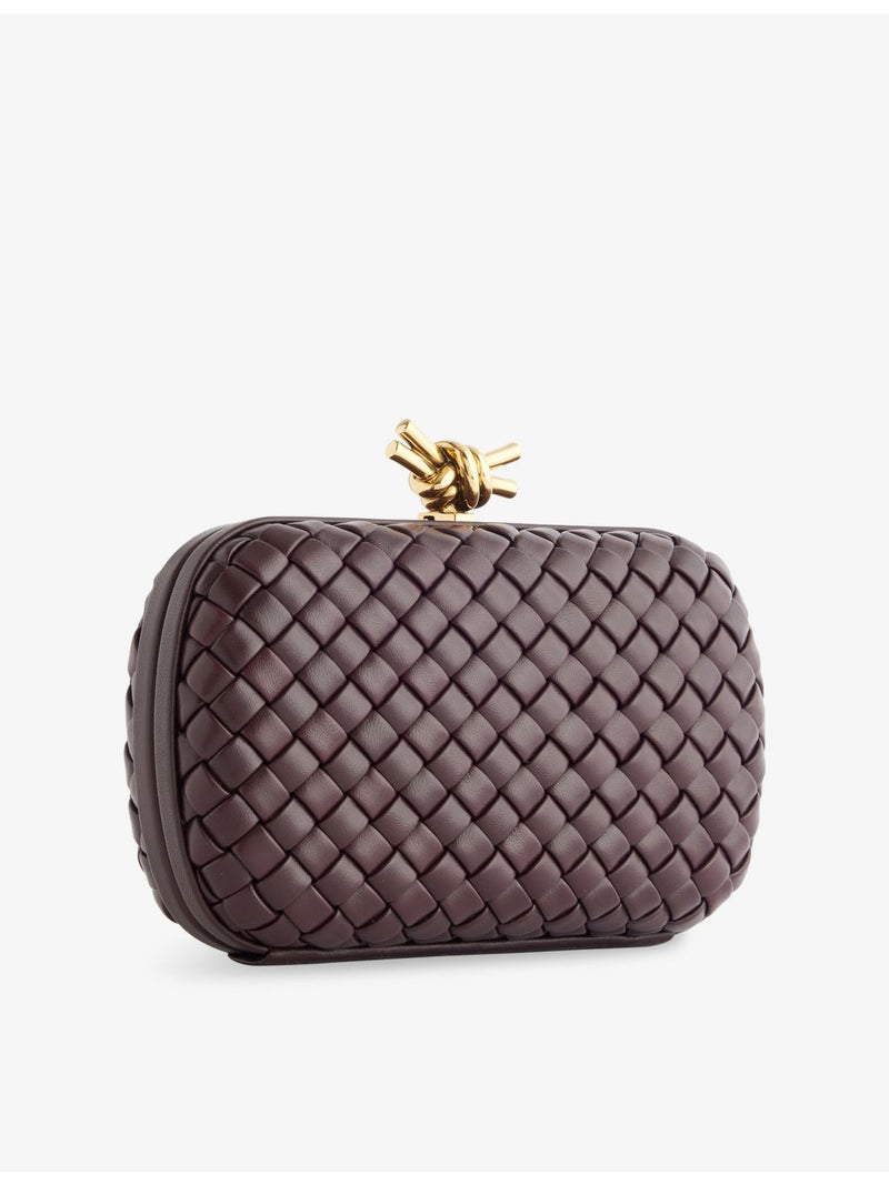 Bottega Veneta intrecciato leather clutch with gold hardware, UK version