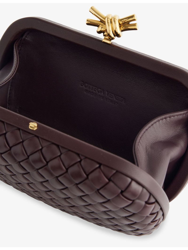 Bottega Veneta intrecciato leather clutch with gold hardware, UK version