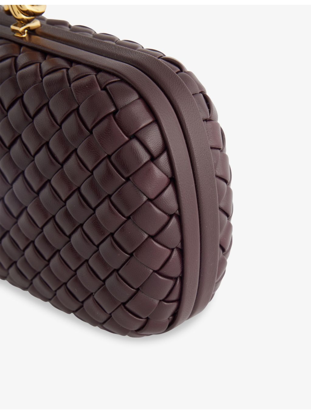 Bottega Veneta intrecciato leather clutch with gold hardware, UK version