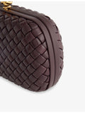 Bottega Veneta intrecciato leather clutch with gold hardware, UK version