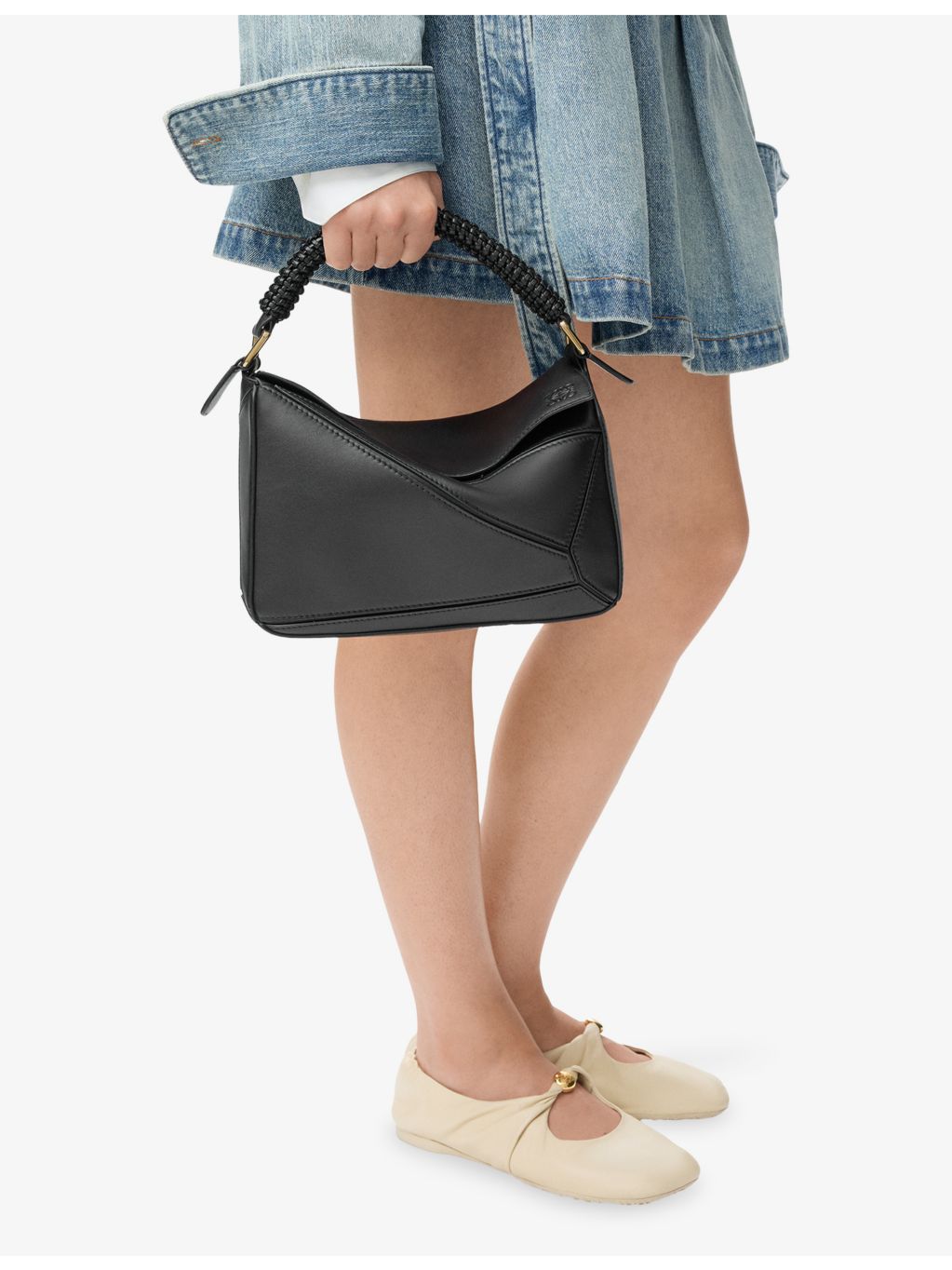Loewe leather cross-body bag with woven handle (British brand)