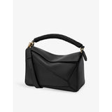 Loewe leather cross-body bag with woven handle (British brand)