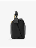 Loewe leather cross-body bag with woven handle (British brand)