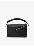 Loewe leather cross-body bag with woven handle (British brand)