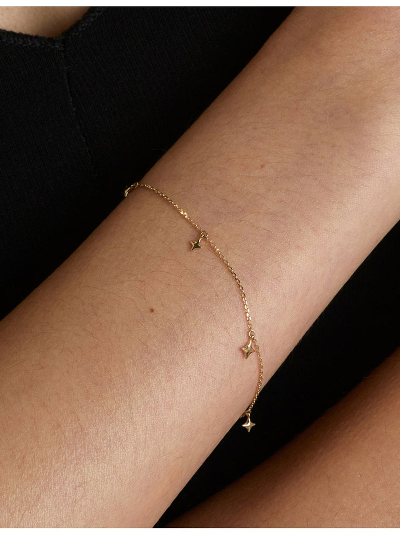 Astrid & Miyu Cosmic Star 14ct yellow-gold charm bracelet - British product