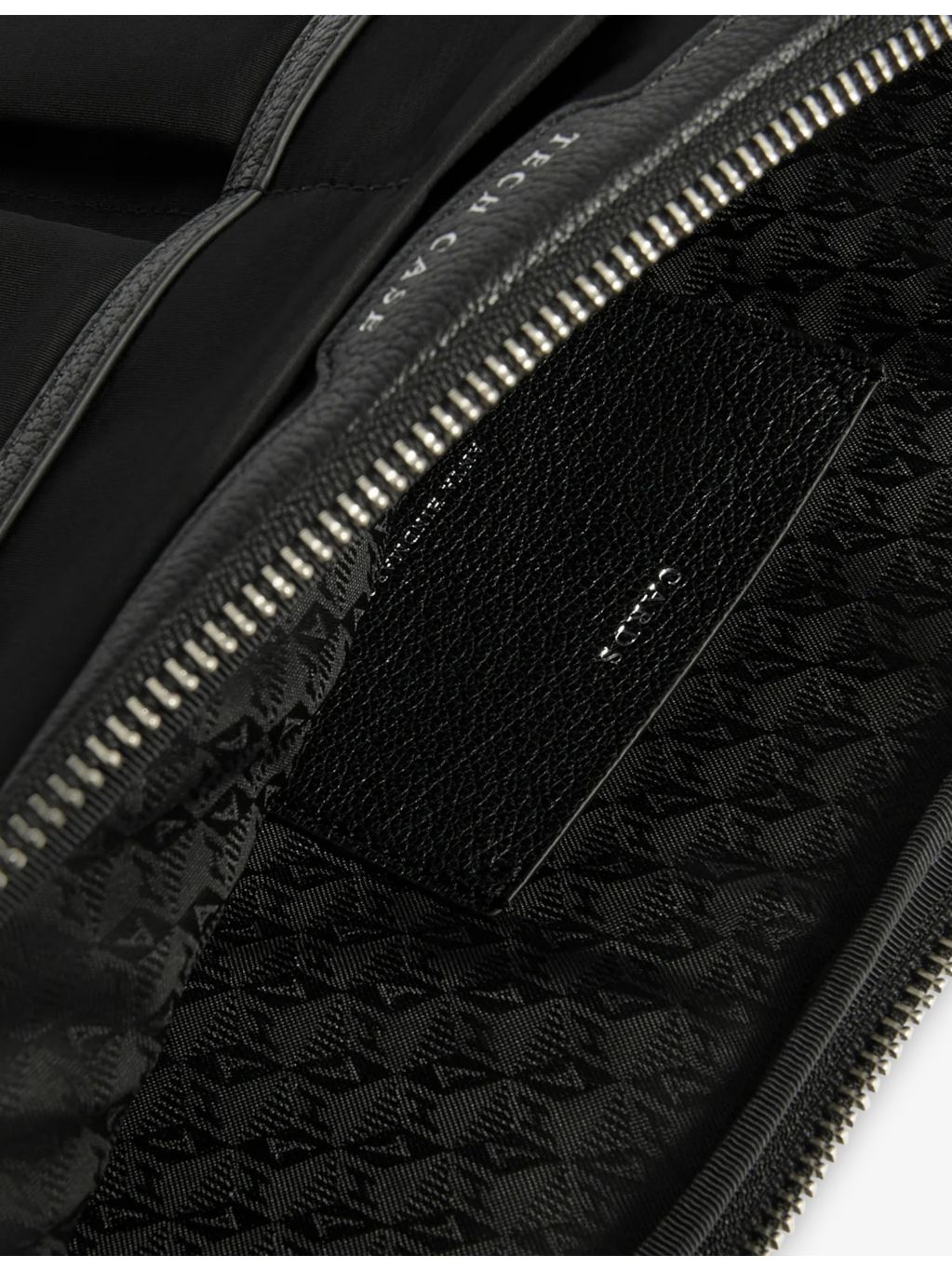 Anya Hindmarch woven nylon laptop case, imported from the UK