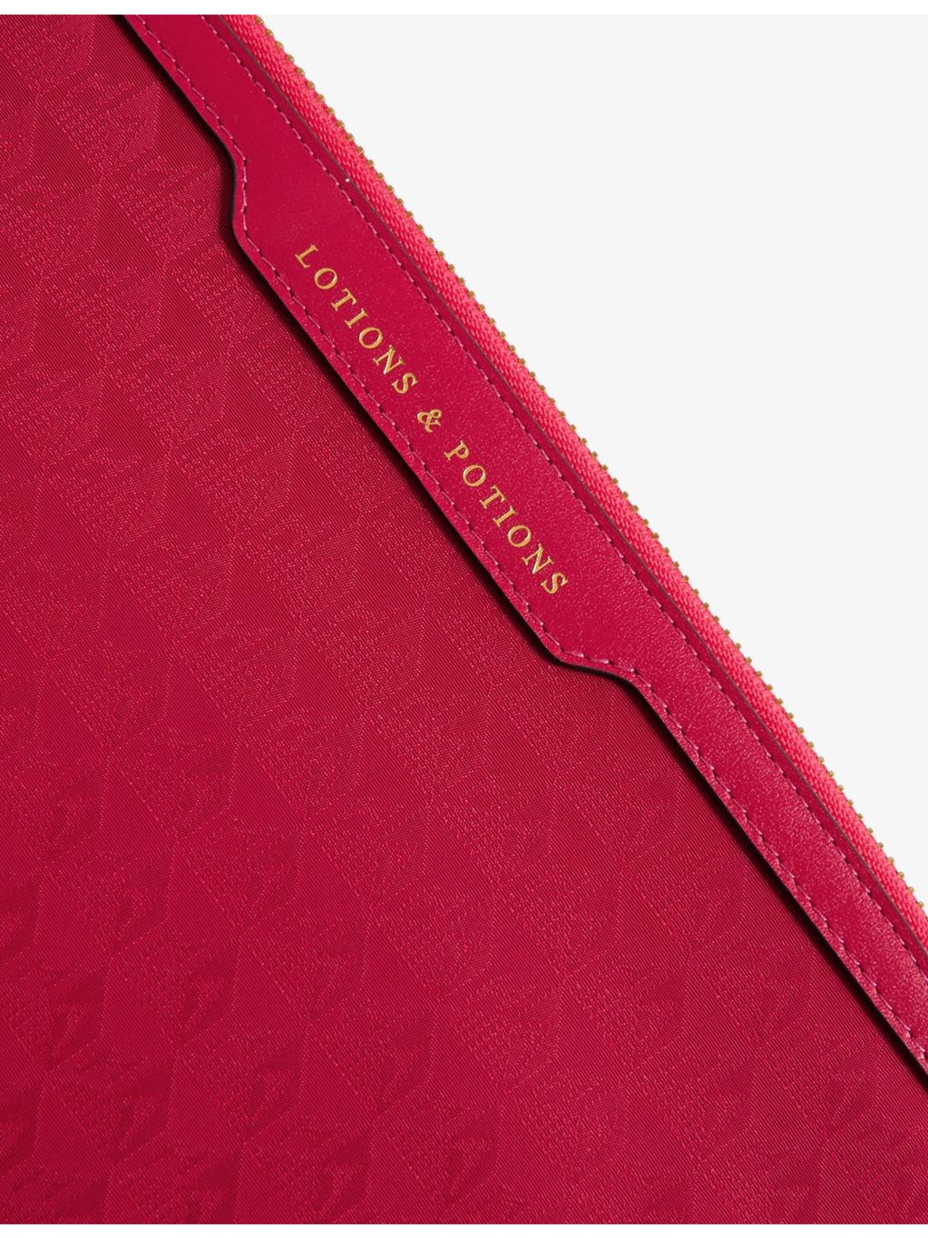 Anya Hindmarch Logo Lotions and Potions woven pouch, UK version